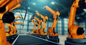 bracos-roboticos-em-uma-fabrica