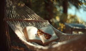 open-book-sunglasses-resting-hammock-scaled